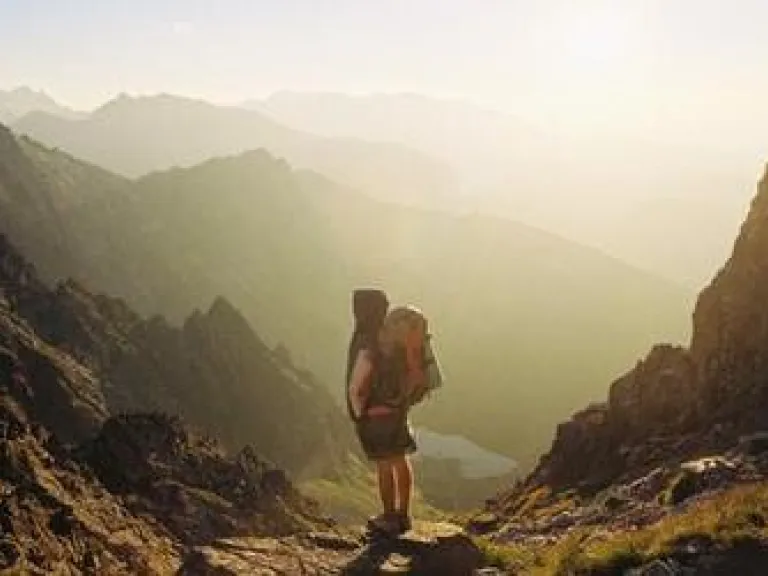 The Battle for the Bible, Part 2: Scaling the Mountain of Ignorance A person a top of a mountain peak.