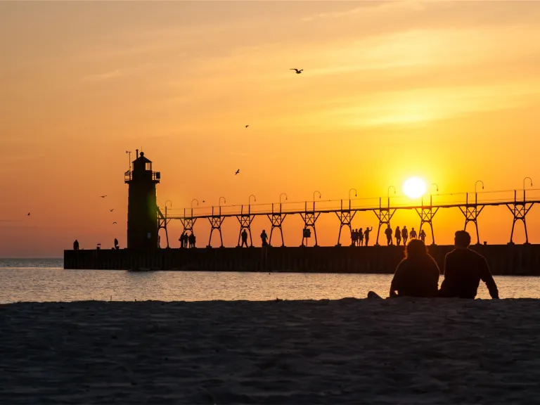 The Sabbath is a both a sign of creation and a sign of redemption. It is a reminder both that God created us, and that He desires to save us. Sunset over a pier going into the ocean.