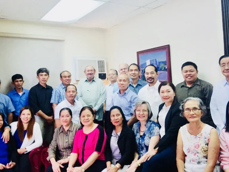 Earl Roemer with members in the Philippines. Earl Roemer with members in the Philippines.