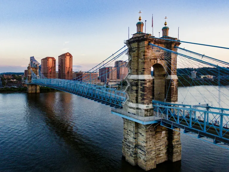 Sign up for Winter Family Weekend! a bridge over a lake