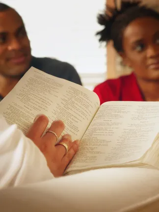Young people studying the Bible.