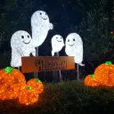 Light-up ghosts and pumpkins with a Halloween sign