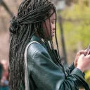 a woman looking at her smartphone