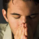A man praying.