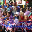 Girls on a parade float.