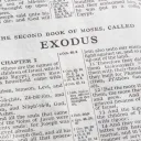 A Bible opened to the book of Exodus.