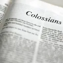 A Bible laying on a table.