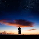 A silhouette of young man.