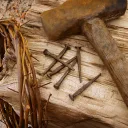 Crown of thorns, old nails and old hammer.