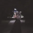 A woman looking away.