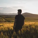 A man standing in a field.