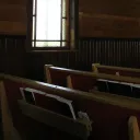 Pews inside a church.