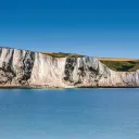 The White Cliffs of Dover are cliffs that form part of the English coastline facing the Strait of Dover and France.