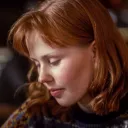 A woman looking down..