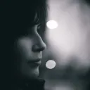 A side profile of a woman.