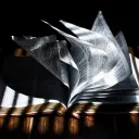 A Bible laying on a table.