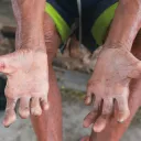 A man's arms and hands.