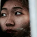 Upclose photo of a women's face.