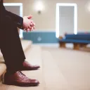 A man sitting inside a church.
