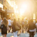 People walking on a sidewalk.