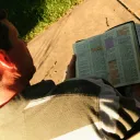 A man reading a Bible.