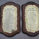 Photo of two plaques with the Ten Commandments written on them in English and Spanish.