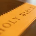 Bible laying on top of a table