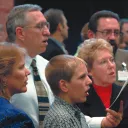 People singing during church service.