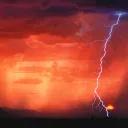 A storm with clouds, rain and lightning.