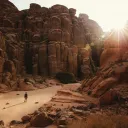 A man walking in the desert.