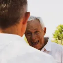 A father and son interacting.