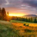 A sunset over a mountain ridge.