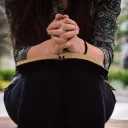 A woman reading a Bible.