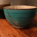 green-blue bowl with golden joinery