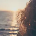 A woman looking out on the ocean.