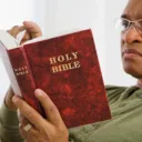 Man reading the Bible.