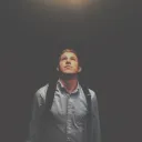 A young man looking up.