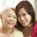 A young woman and her older mother.