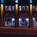 A storefront at night.