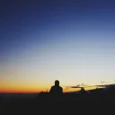 A person watching the sunset.