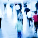 A crowd of people walking.