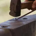 blacksmith anvil and tools