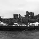 A old castle with broken fortress walls.