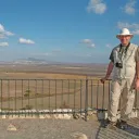 Darris McNeely stands atop the hill of Megiddo.