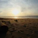 Sunset over a beach.