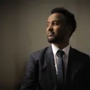 a man wearing a business suit and tie