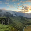 Mountain landscape with setting sun