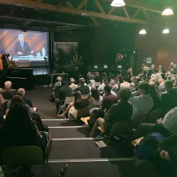 2024 Feast of Tabernacles Club Miléade La Gaillarde, France people seated in church to watch a video sermon