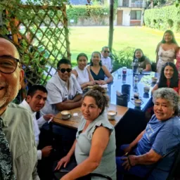 2024 Feast of Tabernacles Panajachel, Guatemala a group of people seated around tables outdoors