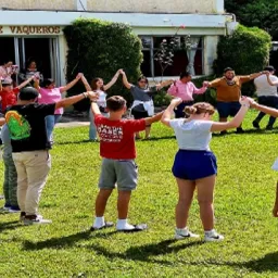2024 Feast of Tabernacles Panajachel, Guatemala a group of people standing in a circle outdoors with hands joined